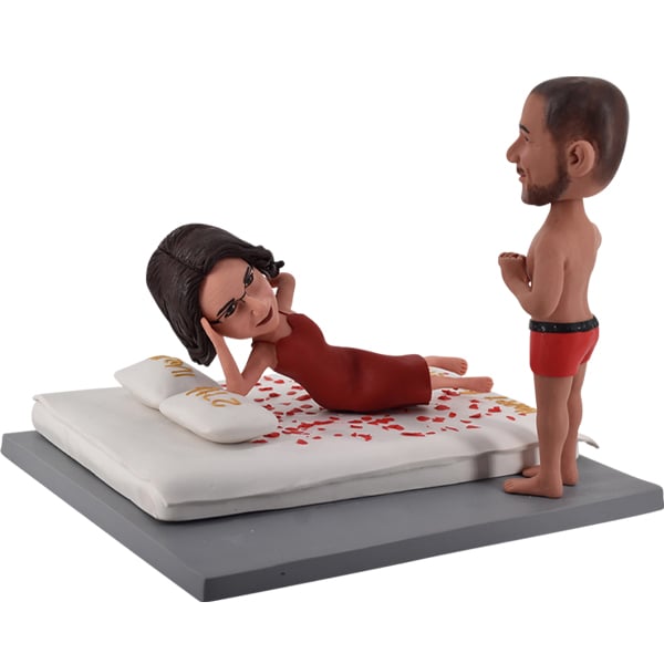 4. Bbobbler Couple Bobblehead Man Standing Before Her Bed