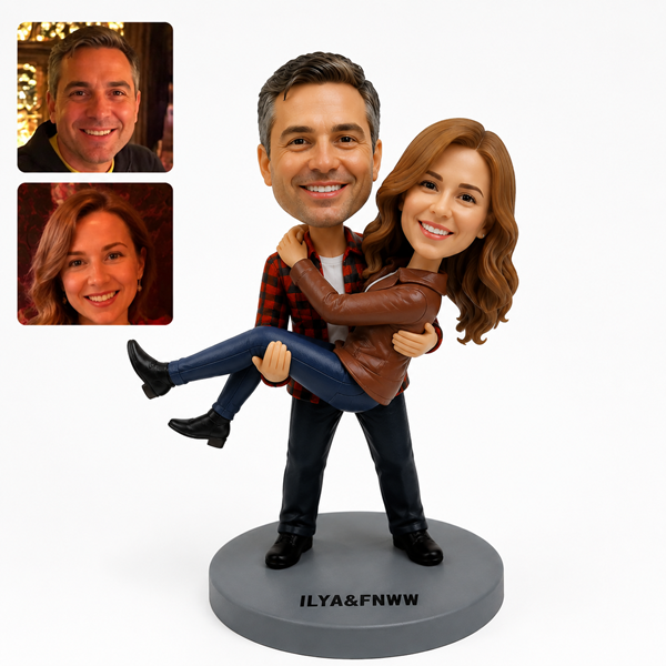 Couple bobblehead man carrying woman3