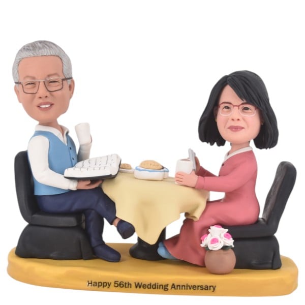 FBB15487-1 couple wedding bobble heads sitting with Bible