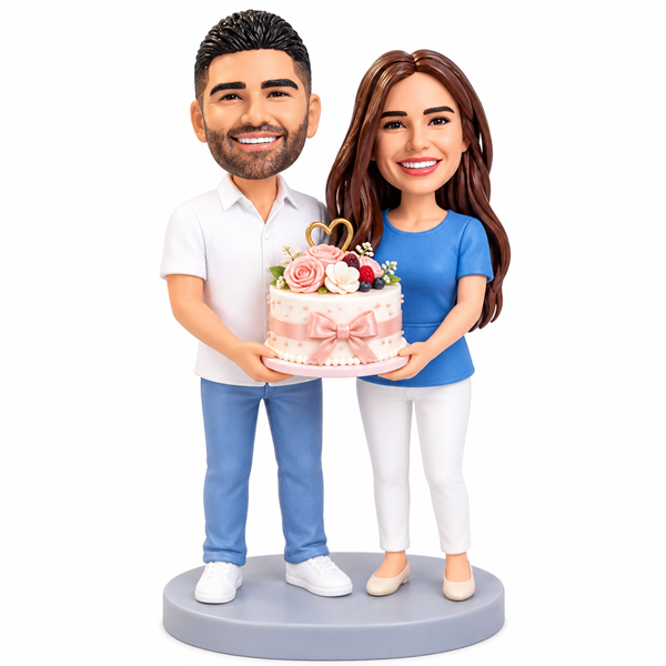Couple Bobblehead holding cake